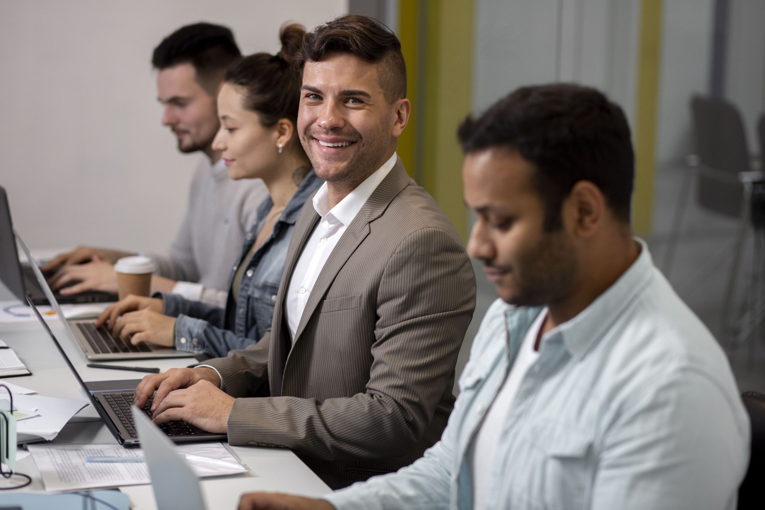 House of IT professionals collaborating on managed support services